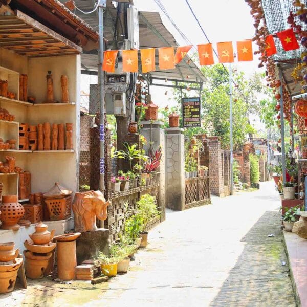 Tourists experience pottery making at Thanh Ha pottery village