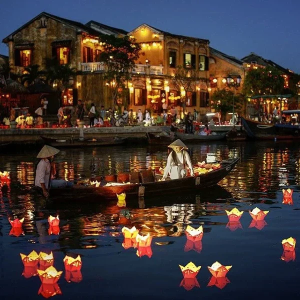 Release flower lantern on river in Hoi An