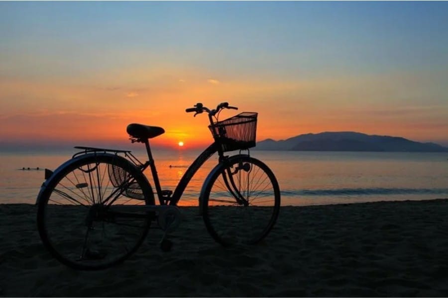 Riding a bike along the coastal streets is a must - do activity when visiting Nha Trang