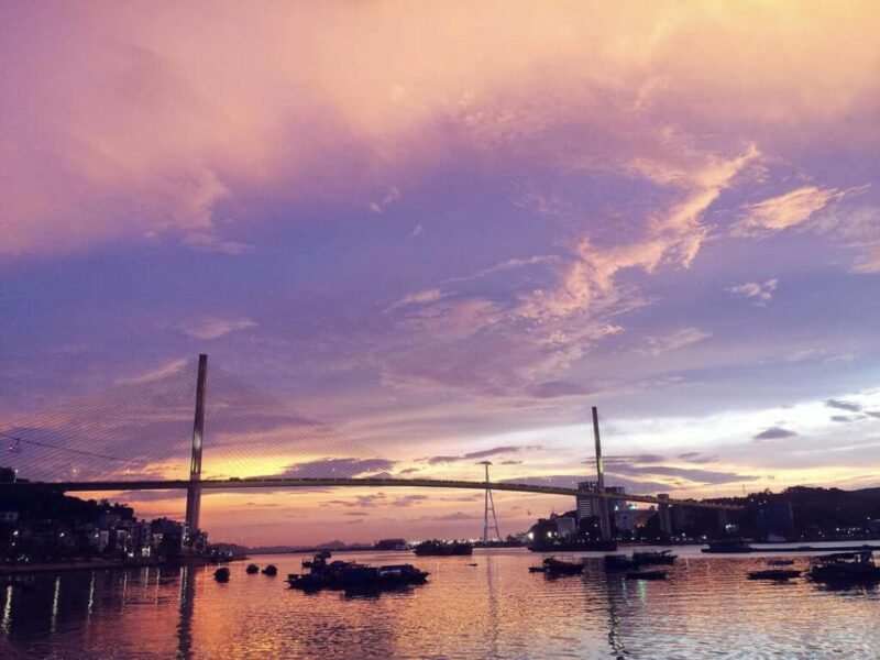 Watch Halong Bay sunset at Bai Chay bridge