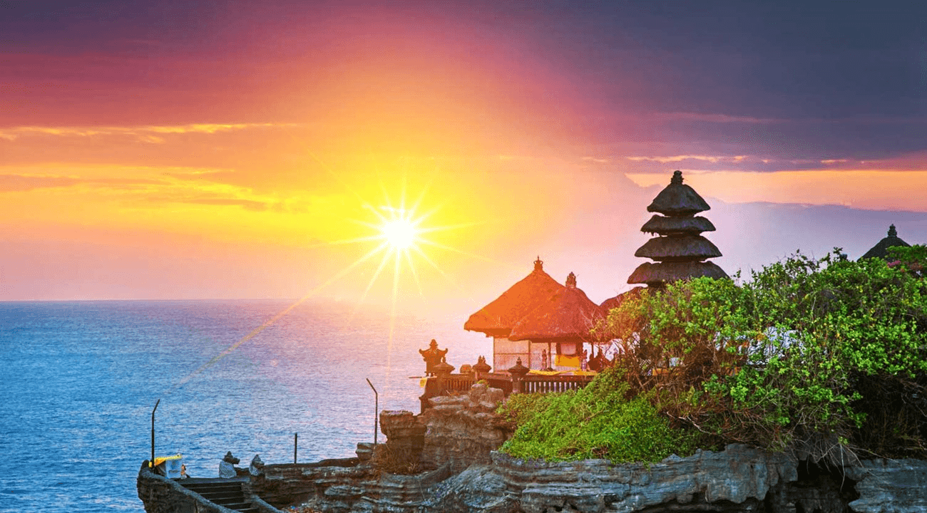 Tanah Lot Temple captured under the sunset in the right corner