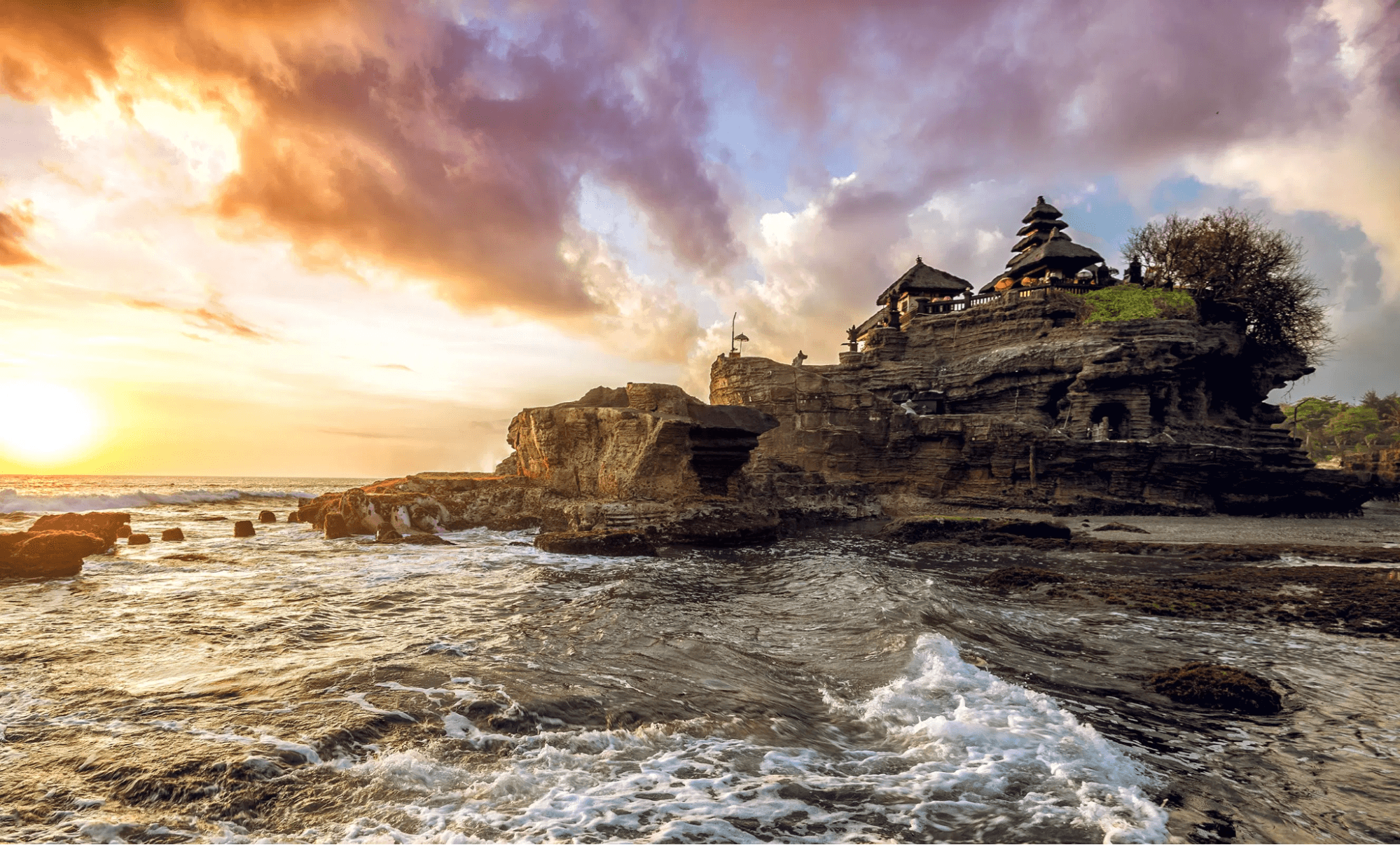 Tanah Lot Temple taken from the beach on the left side of the temple