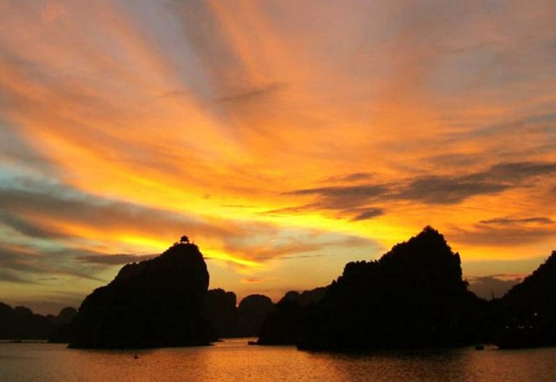 Ti Top Island offers a peaceful escape, perfect for relaxing and fully enjoying the beauty of HaLong Bay sunset.