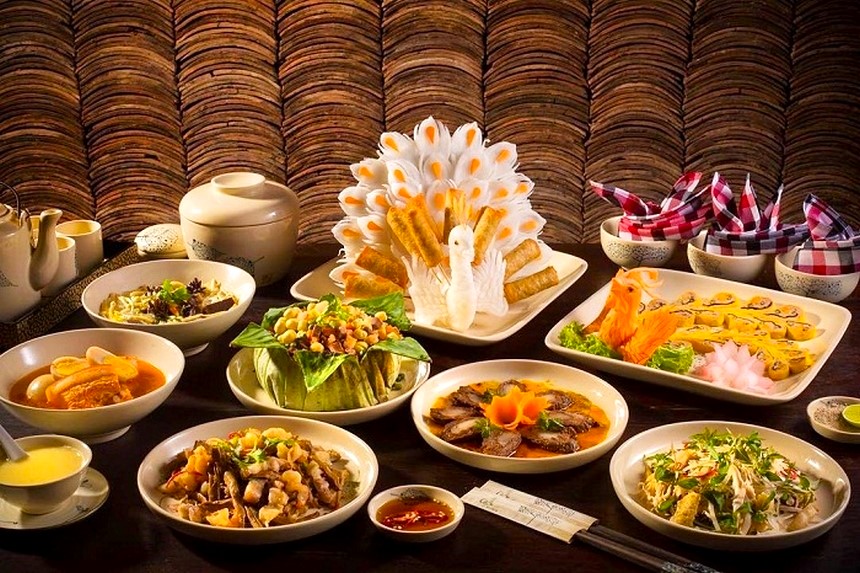 Try a Hue royal-style dinner with small portions dishes like banh beo, banh nam