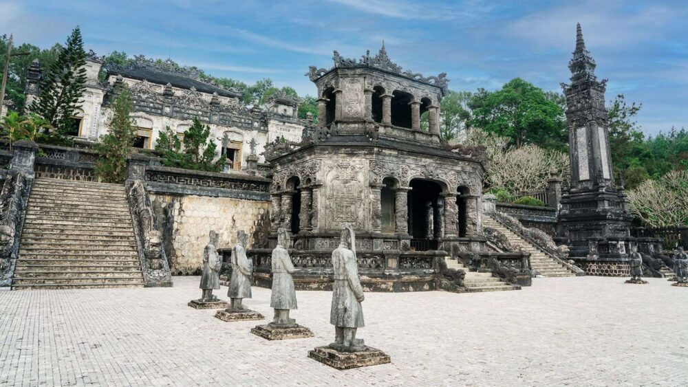 Emperor Khai Dinh's Tomb features carved stone mandarins and animals as symbolic guardians