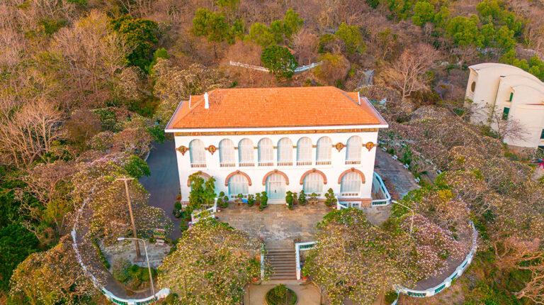 Bach Dinh Roman-Greek architecture features a striking red-tiled roof