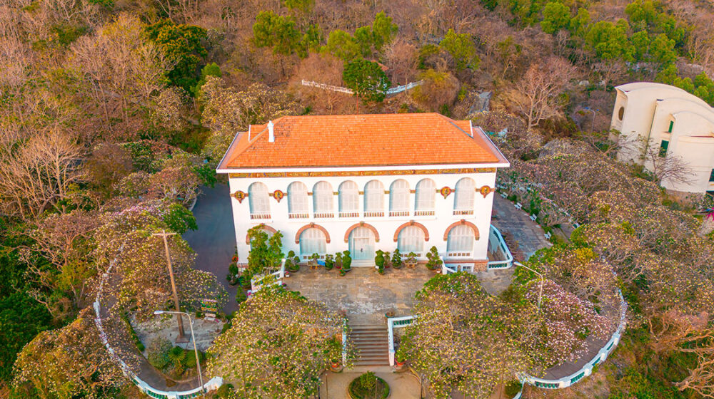 Bach Dinh Roman-Greek architecture features a striking red-tiled roof